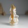 Souvenir Polystone "Snowman skier in a white-gold outfit" 5.5x5x10.2 cm