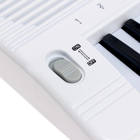 Synthesizer "Musician" with a microphone, 49 keys, works on a network and from batteries-5