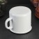 Emalous mug with a nose, 1 l, with a lid, white color