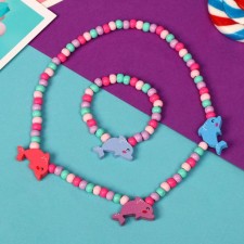 Set of children's “chosen” 2 subjects: beads, bracelet, dolphins, color mix