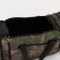 Road bag on a zipper with an increase, 3 outer pockets, a long belt, khaki/camouflage color