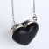 Female bag on a magnet, black color