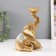 Polystone candlestick for 1 candle "Sitting elephant with a trunk up" 7.5x10.5x16.2 cm