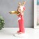 Souvenir Polystone stand "Baby with paper aircraft" pink 35x21x13 cm