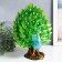Polystone souvenir "Blue peacock with green, blossoming tail in the meadow" 13x30x35 cm