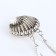 Female bag on a magnet, silver color