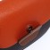 Richet bag on a magnet, a long belt, an orange/brown color