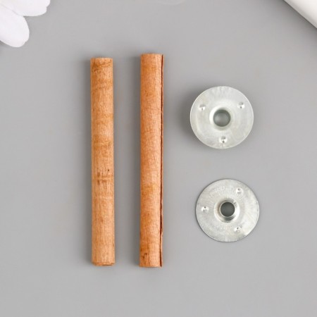 A candle wick with a metal holder is a round 0.6x6.5 cm-3