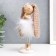 Polystone souvenir "Zayushka with a bow in a downy skirt" 27x5.8.8 cm