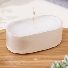 Candle in an oval candlestick of gypsum, 9.5x4.7x3cm, white mother of pearl