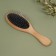 Massage comb, 22 × 7 cm, beige color/black