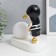 Souvenir Polystone Light "Baby in a black cap, with a gold bubble at the ball" 16.5x8x16 cm