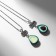 Kulons "Demetrines" avocados, green-brown color in black silver, l = 45 cm