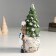 Polystone souvenir "Santa Claus in a cap-flap, with a birdhouse and a bird" 9x8x19.5 cm