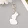 Acryl keychain "Snake in a knitted hat of a bunny" 6x3.6 cm