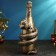 The piggy bank "Snake with champagne" Black gold, 35x16x16cm