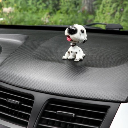 Dog on a car panel shocking his head, Dalmatian-1
