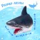 The soft figure of the animal "Shark" is put on hand