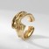 Ring Metal "Trend" is crumpled, wide, the color of gold, dimensionless