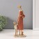 Polystone souvenir "Mom with a son with a basket of flowers" Red-borded 5x9.8x24 cm