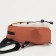 Male sling bag from textiles, orange/beige color