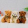 Soft toy "Bear Cinter", bow, cage, color mix