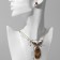 Set 2 objects: earrings, pendant “Wings”, white-red color in black gold, 48 cm