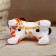 Dymkovo toy "Orange dog" 7 cm