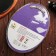 A set of kitchen utensils, 4 objects: knife, scissors with an anti -daliped coating, vegetable cleaning, board, purple color