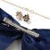 Set "Chosulka" 3 objects: hairpin, clips, pendant, flowers, white-blue color in gold