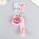 Trick Rubber "Ball Svinka" with bracelet and carbine, pink 4x6.5x5.5 cm