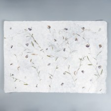 Handmade paper with flowers and herbs 