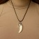 Unisex pendant “Fang sharks”, white color in black silver on a black lace, 45 cm