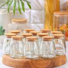 A set of glass jars for spices with a cork lid 