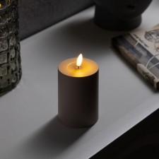 Beige LED candle, 7 × 13 × 7 cm, plastic, AAX2 batteries (not complete), warm white glow