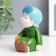 Polystone souvenir "Baby in a green coat with a bandaged ear" 5.5x9.5x6 cm
