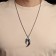 Pendant of the male "opening" bend, silver color, 69 cm