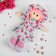 Soft doll "Masha", a flower dress, color mix
