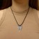 Unisex Cure "Wings", Color Black Silver on a Black Cord, 42 cm