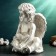Figure "Big Angel sits with flowers" 34x23x23cm