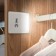Pushlite in a closet self -adhesive surface
