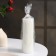 Candle-cylinder with faces, 5x15 cm, white, 10 hours