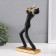 Souvenir Polystone "soloist" black with gold 14x8x27 cm