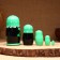 Matryoshka 5-doll "festive green" with God's cow 10-11 cm