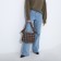 Load bag with zipper, long belt, beige color