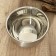 A stainless steel bowl with a measured scale, 1.4 l, d = 17 cm,