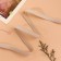 The elastic band is becoming, with an openwork edge, 10 mm, 10 ± 0.5 m, beige color