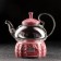 Glass teapot with metal sieve and stand for heating Elegy, 600 ml, red color
