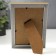 Photo frame plastic 10x15 cm "Golden spiral on black" 17.8x12.8 cm