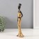 Souvenir Polystone "African Zem in a golden dress, with a vase" 5x6x27 cm